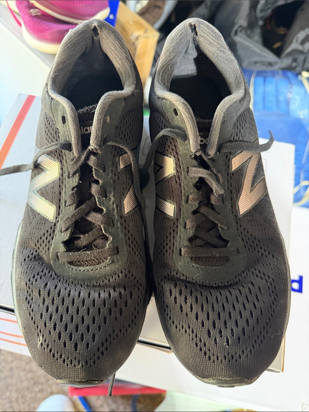 New Balance Black Athletic Shoes with Gold 'N' Logos
